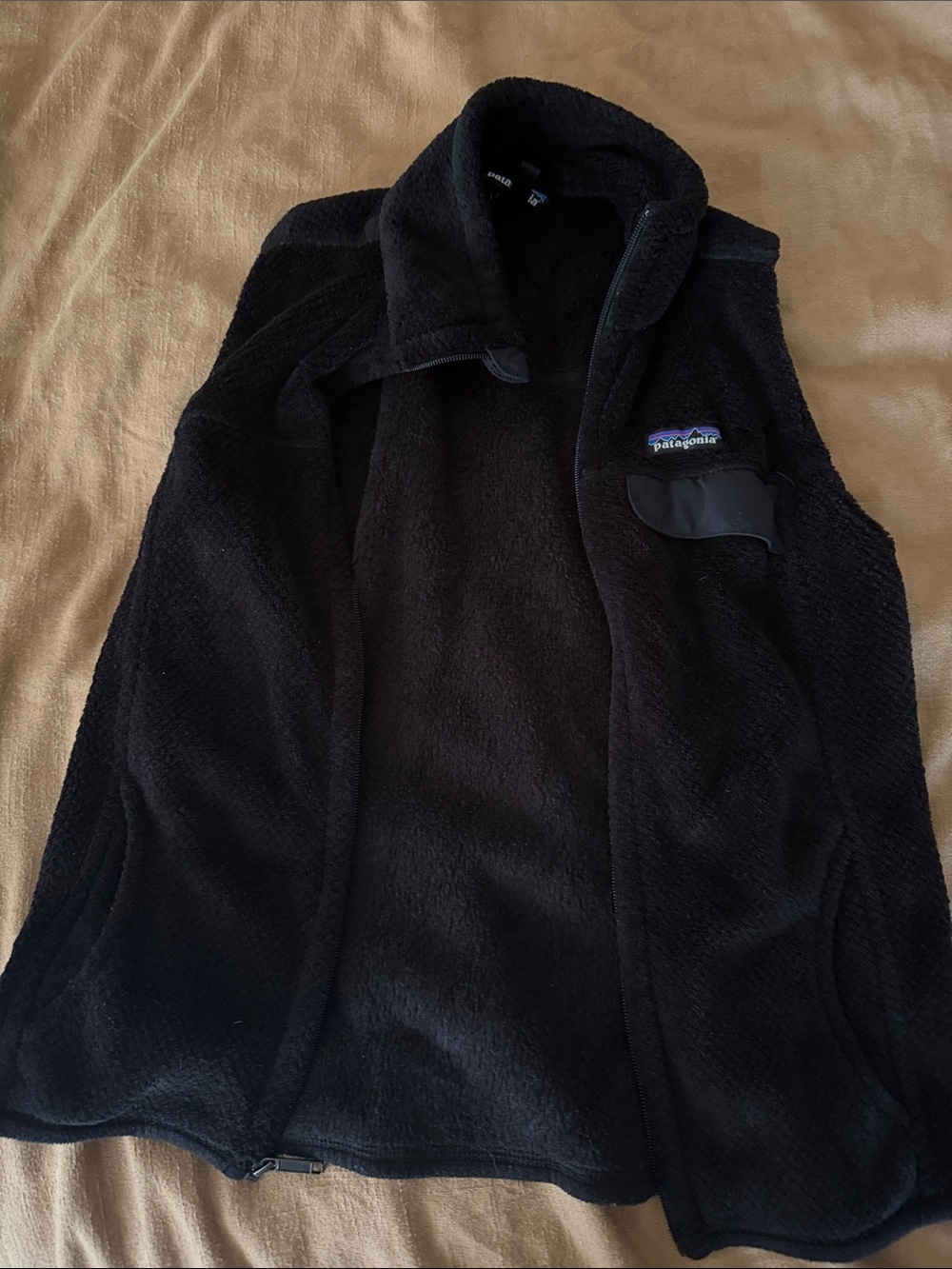Patagonia women’s Black Fleece Vest with Chest Pocket